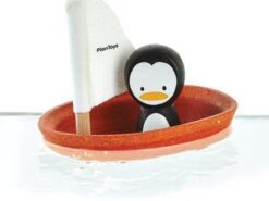 Plan Toys - żaglówka z pingwinem